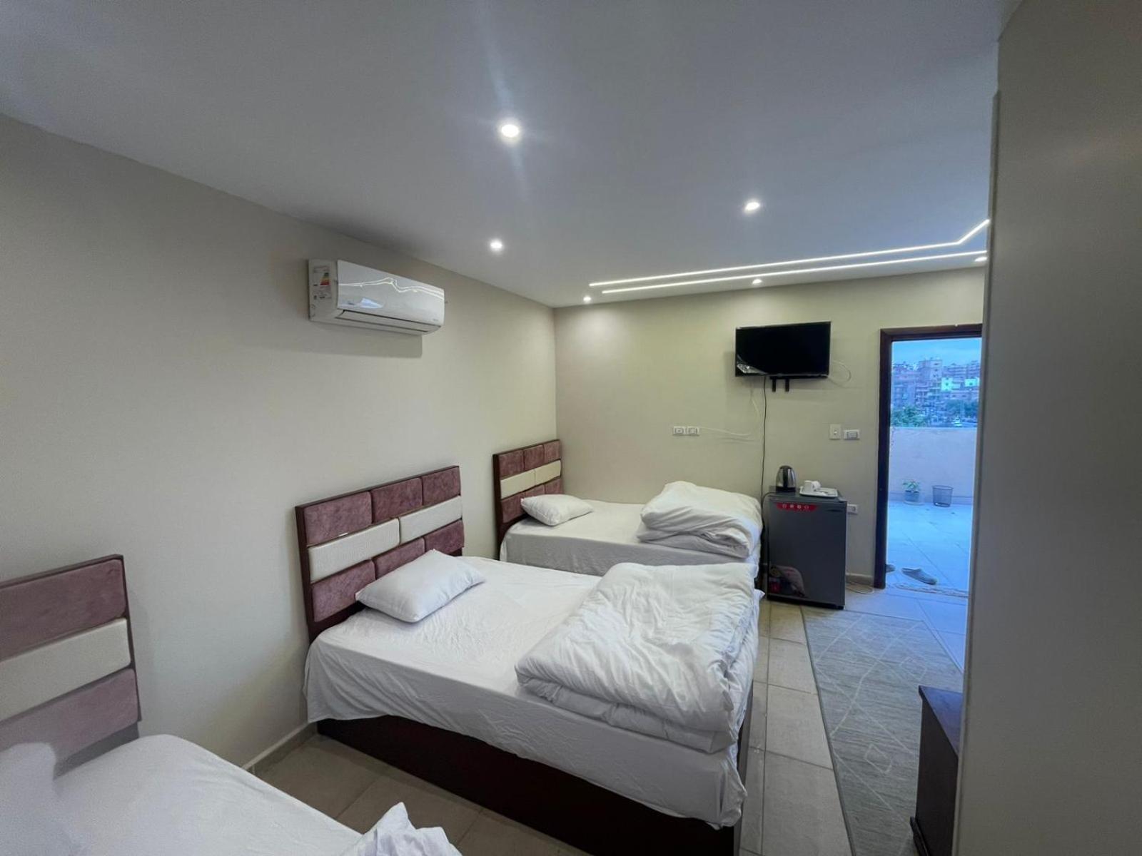 Sami Holiday Inn - Pyramids View Rooftop Al Kawm al Akhdar Extérieur photo
